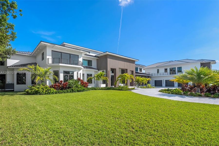 Front exterior of a new home in , Marathon, FL, highlighting curb appeal (Image 32). Front exterior of a new home in , Marathon, FL, highlighting curb appeal (Image 32).