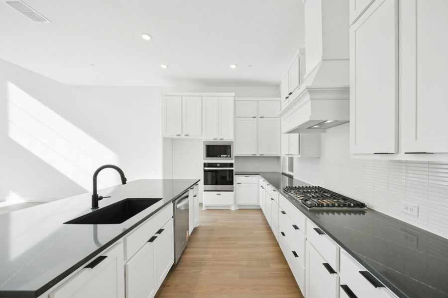 Furnished interior view inside a new home in Newman Village Townhomes, Frisco (Image 6).