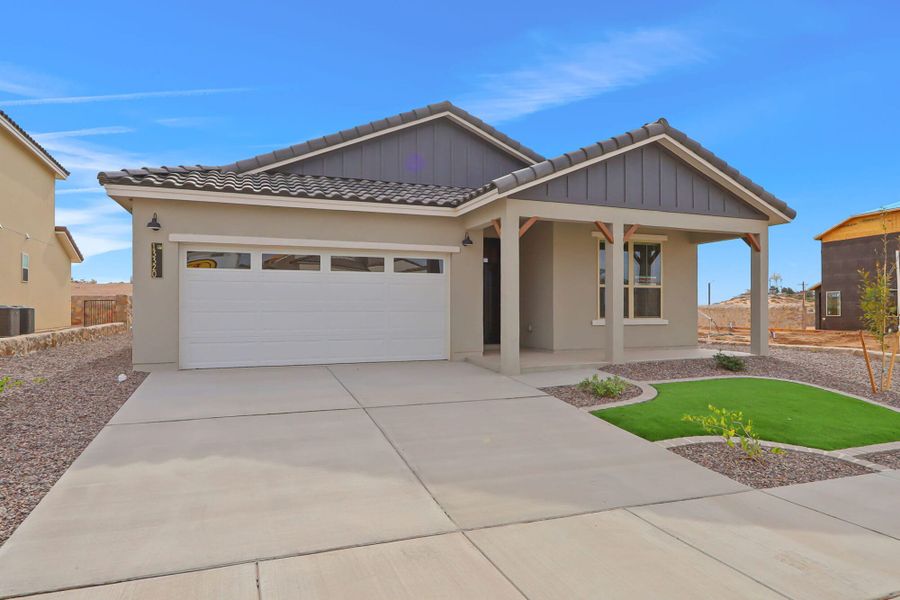 Front exterior of a new home in Emerald Estates, Horizon City, TX, highlighting curb appeal (Image 1).