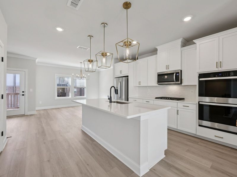 Furnished interior view inside a new home in Hemingway - Highland Series, Cumming (Image 5).