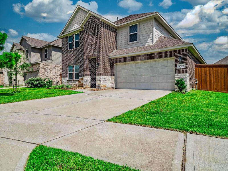 Front exterior of a new home in , Katy, TX, highlighting curb appeal (Image 22).