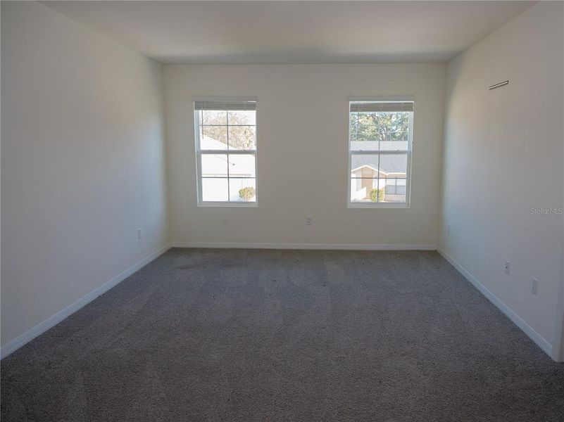 Spacious, unfurnished interior of a new home in Poinciana Enclave, Kissimmee (Image 21).