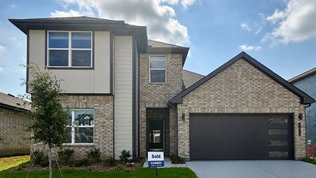 Representative exterior photo of a completed home built from the Copaiba by D.R. Horton in The Preserve at Forum, Grand Prairie, TX (Image 16).