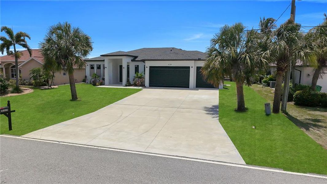 Front exterior of a new home in , Port Charlotte, FL, highlighting curb appeal (Image 21). Front exterior of a new home in , Port Charlotte, FL, highlighting curb appeal (Image 21).