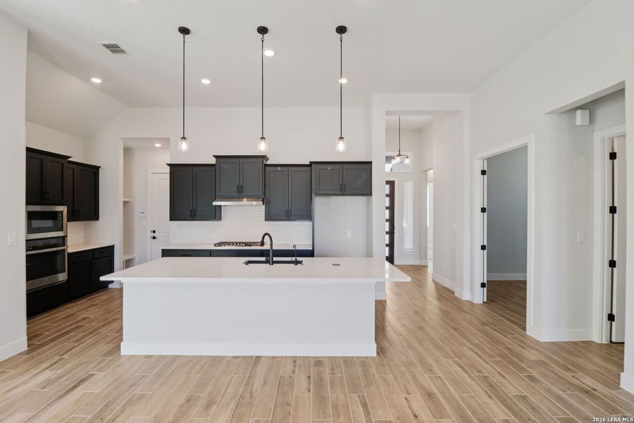 Furnished interior view inside a new home in Village at Three Oaks, Seguin (Image 4).