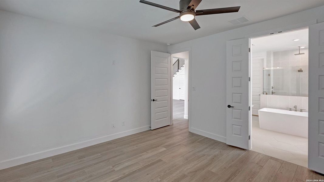 Spacious, unfurnished interior of a new home in The Dominion, San Antonio (Image 20).