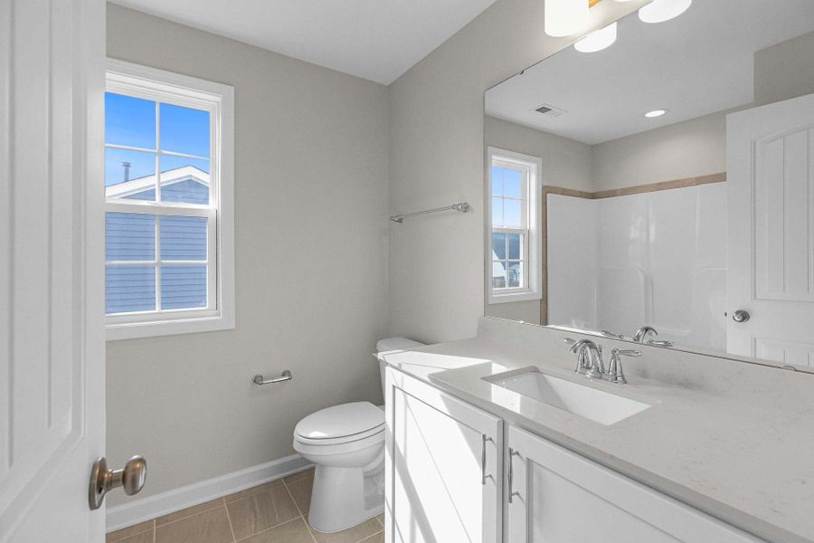 Representative furnished interior of a home built from the Clayton by Caviness & Cates Communities in Bartlett Manor, Youngsville (Image 210).