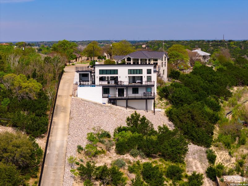 Front exterior of a new home in , Kerrville, TX, highlighting curb appeal (Image 23).