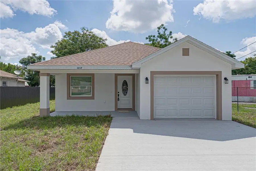 Front exterior of a new home in , Lakeland, FL, highlighting curb appeal (Image 2). Front exterior of a new home in , Lakeland, FL, highlighting curb appeal (Image 2).