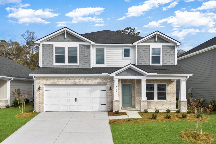 Front exterior of a new home in Waterside - Coastline Series, Longs, SC, highlighting curb appeal (Image 1).