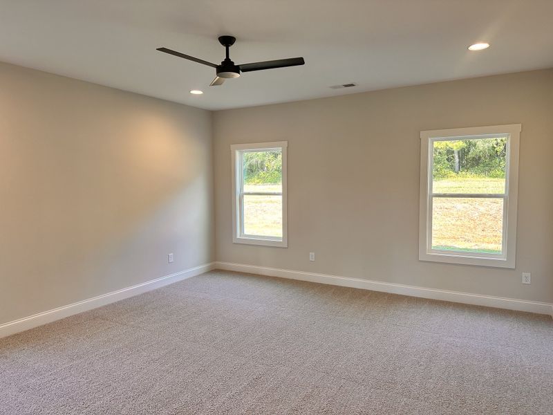 Spacious, unfurnished interior of a new home in The Reserve at Red Oaks, Carrollton (Image 24).