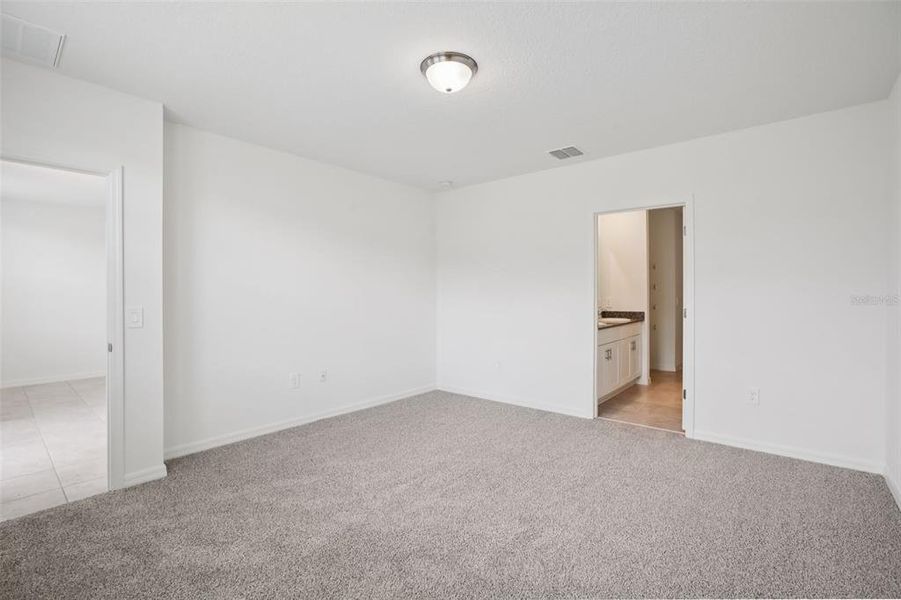 Spacious, unfurnished interior of a new home in Villamar - Classic Series, Winter Haven (Image 24).