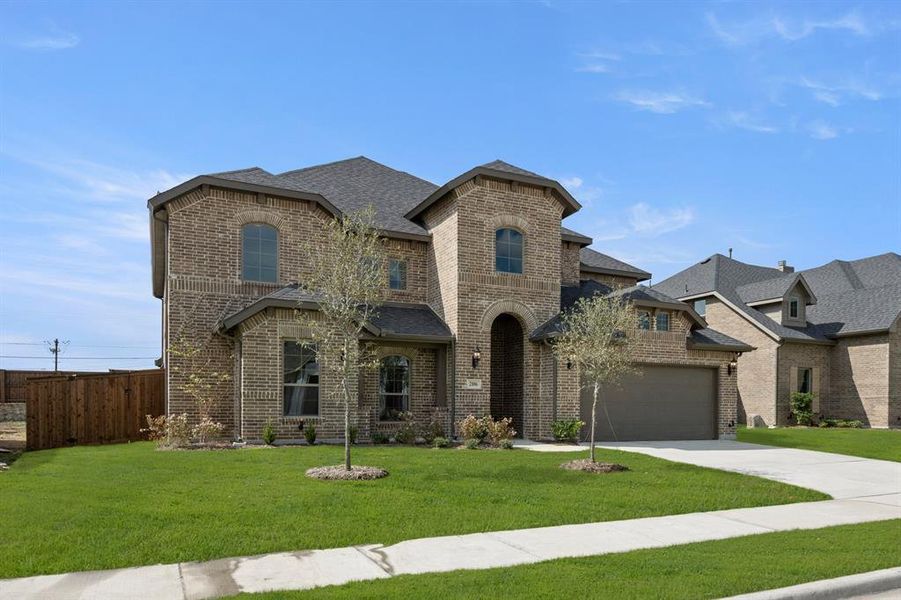 Front exterior of a new home in Somerset, Mansfield, TX, highlighting curb appeal (Image 2). Front exterior of a new home in Somerset, Mansfield, TX, highlighting curb appeal (Image 2).