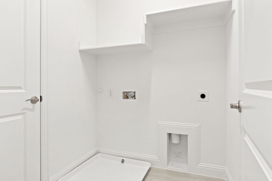 Spacious, unfurnished interior of a new home in The Tribute, The Colony (Image 37).