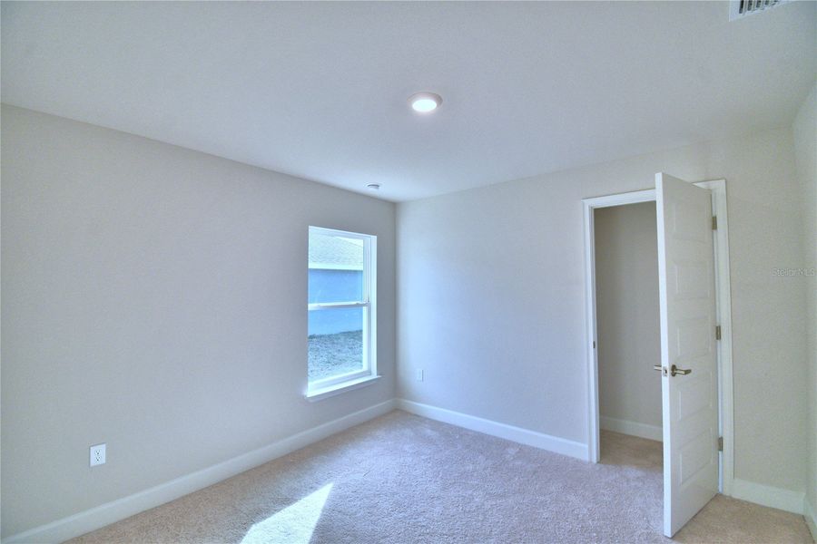 Spacious, unfurnished interior of a new home in Cadence Crossing, Auburndale (Image 29).