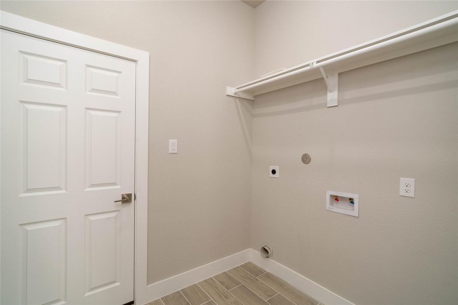 The theme throughout the home is spacious! Look at this oversized in-home laundry room The theme throughout the home is spacious! Look at this oversized in-home laundry room