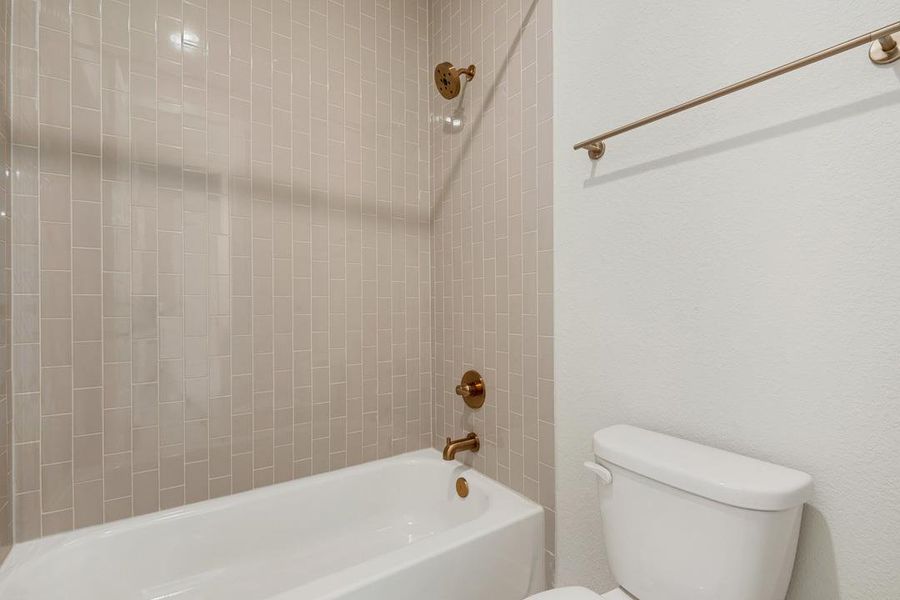 Furnished interior view inside a new home in Terrace Collection at Lariat, Liberty Hill (Image 12). Furnished interior view inside a new home in Terrace Collection at Lariat, Liberty Hill (Image 12).