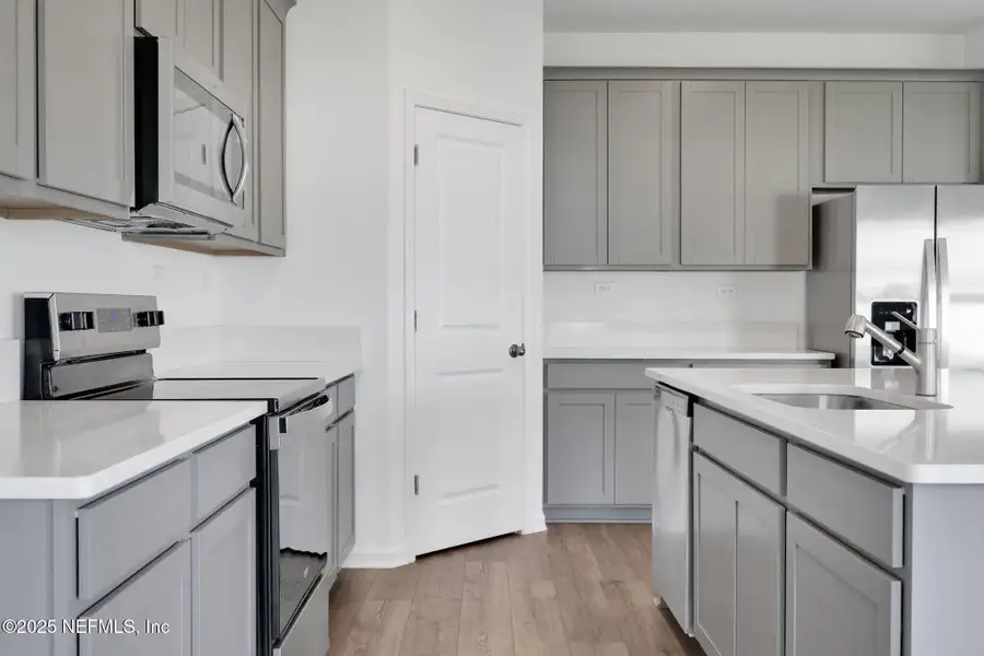 Furnished interior view inside a new home in Amberly, Green Cove Springs (Image 3).