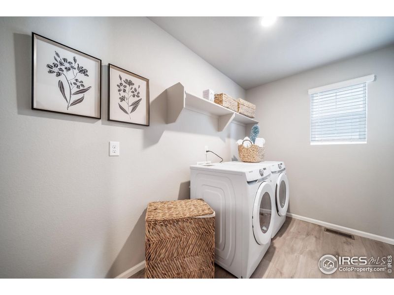 Furnished interior view inside a new home in Thompson River Ranch, Johnstown (Image 27).
