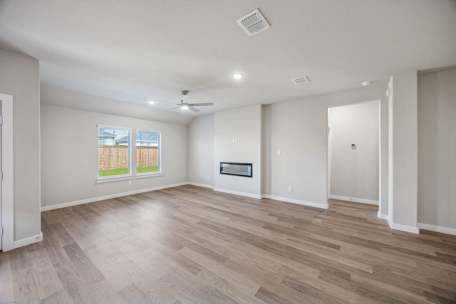 Living Room in the Heisman home plan by Trophy Signature Homes – REPRESENTATIVE PHOTO