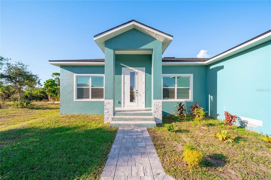 Exterior details and patio area of a home in , Port Charlotte (Image 1). Exterior details and patio area of a home in , Port Charlotte (Image 1).