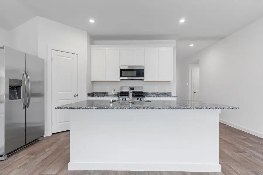 Furnished interior view inside a new home in Blue Heron Estates, Beasley (Image 4).