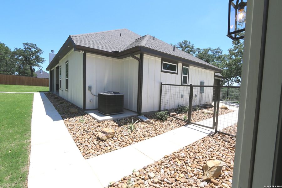 Exterior details and patio area of a home in , La Vernia (Image 38).