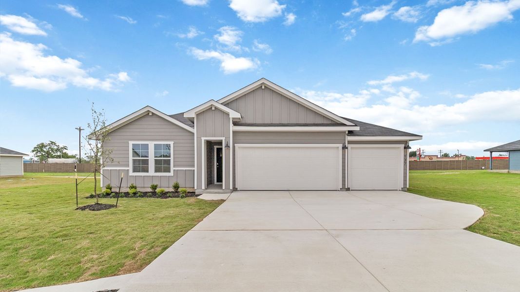 Front exterior of a new home in Railhead, Cedar Creek, TX, highlighting curb appeal (Image 2). Front exterior of a new home in Railhead, Cedar Creek, TX, highlighting curb appeal (Image 2).