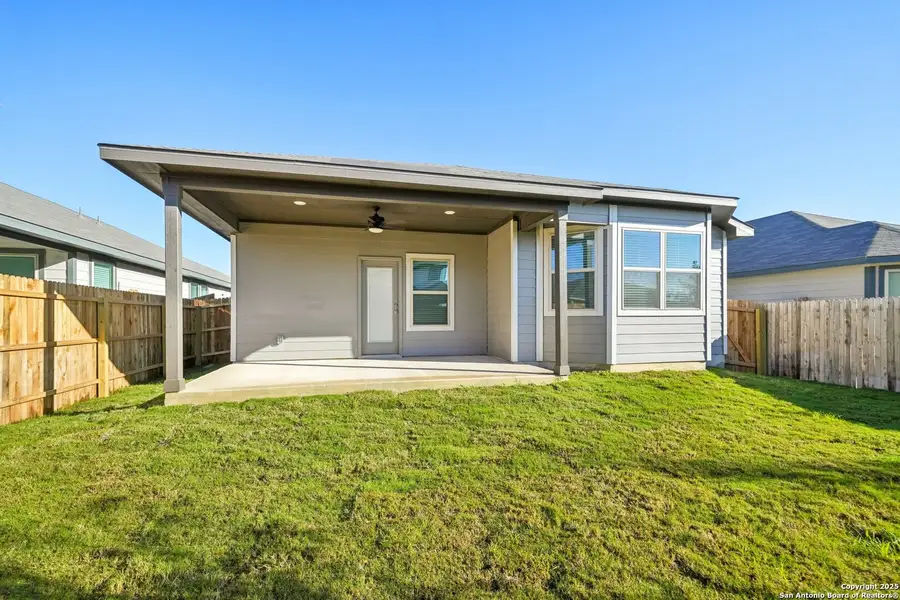 Exterior details and patio area of a home in Catalina, Converse (Image 3).