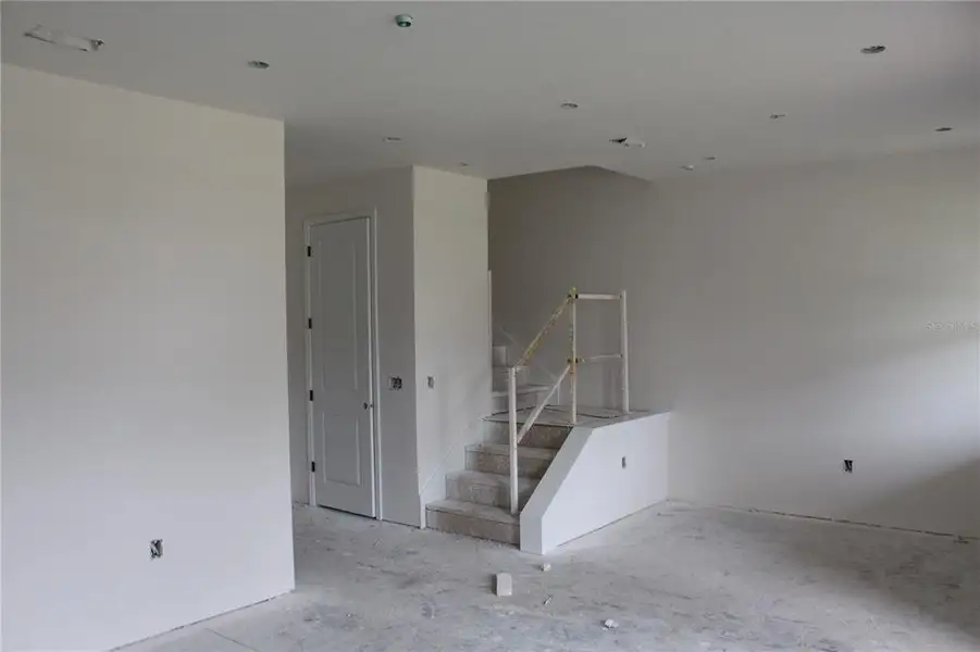In-progress construction of a new home in EvenTide, New Smyrna Beach, FL (Image 26).