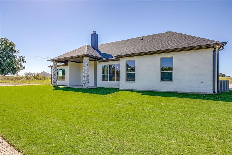 Exterior details and patio area of a home in , Poolville (Image 26). Exterior details and patio area of a home in , Poolville (Image 26).