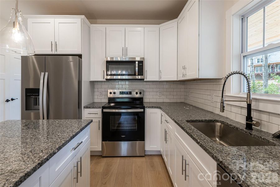 Furnished interior view inside a new home in , Fairview (Image 5).
