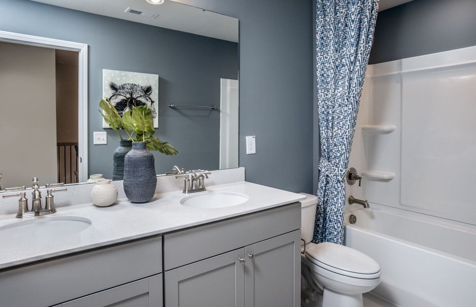 Furnished interior view inside a new home in Exchange at 401, Raleigh (Image 12).