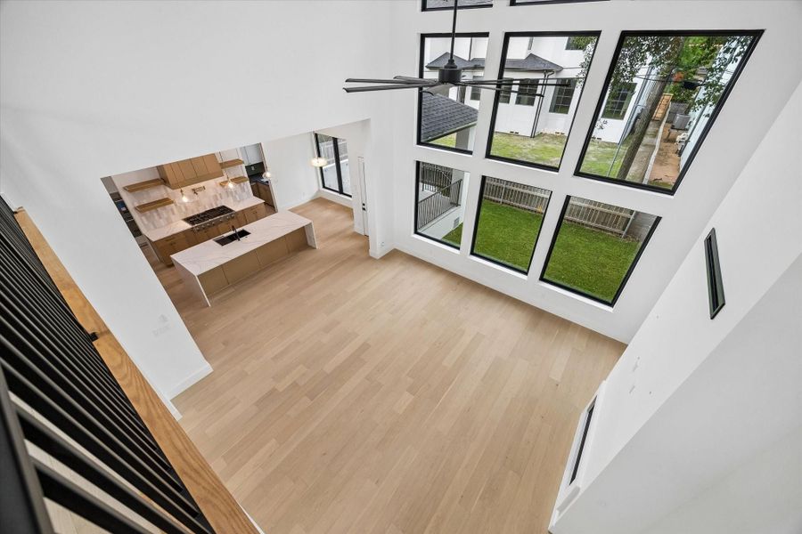 Over 1,000 sf of joined open areas with an entire wall of windows breathe life into the Family Room and set the stage for entertaining friends and family.