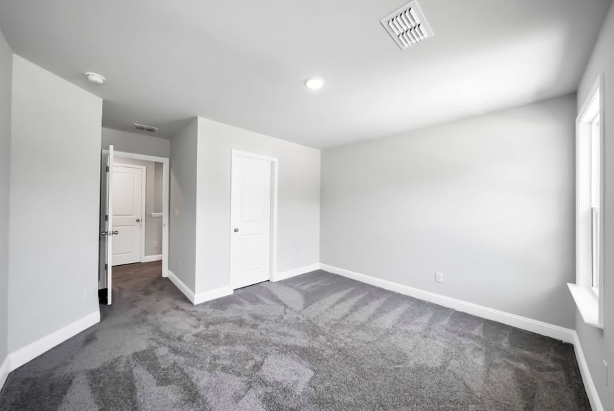 Spacious, unfurnished interior of a new home in Monroe Preserve, Chapin (Image 17).