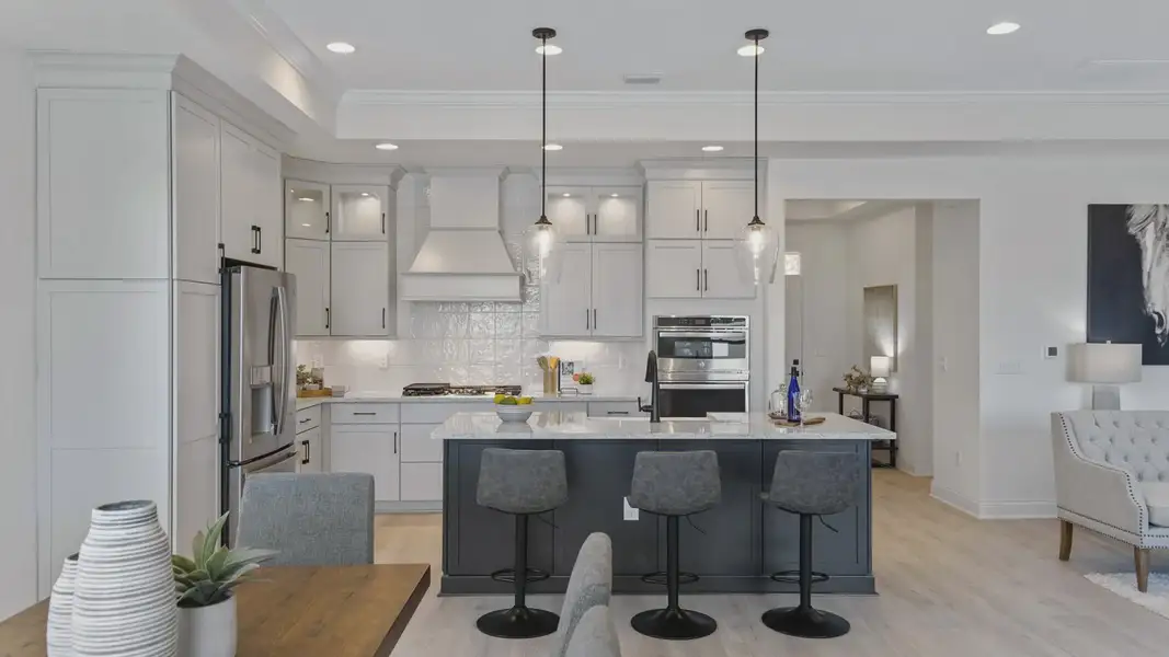Representative furnished interior of a home built from the Salerno by Epcon Communities in Courtyards by Carrell, Ocean Isle Beach (Image 8).