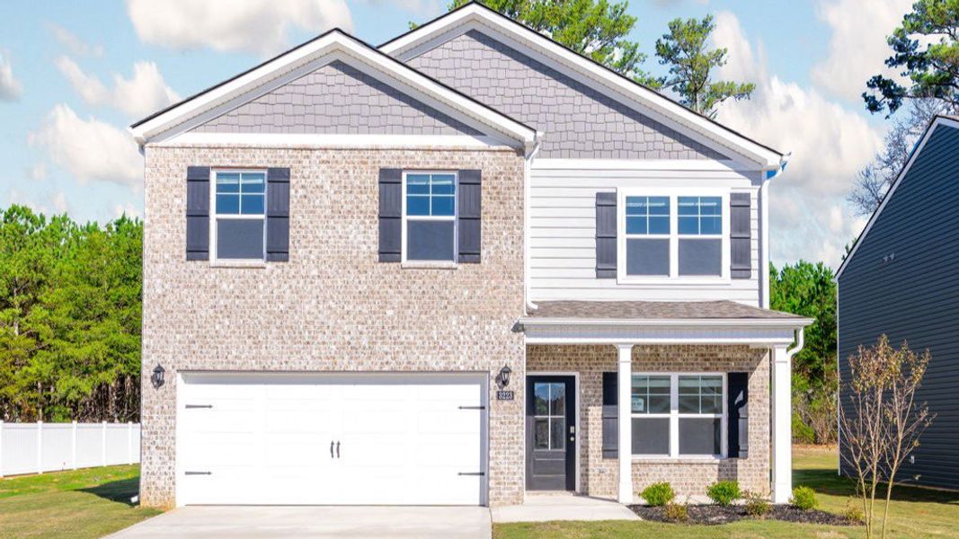 Front exterior of a new home in Hillcrest Landing, McDonald, TN, highlighting curb appeal (Image 1).