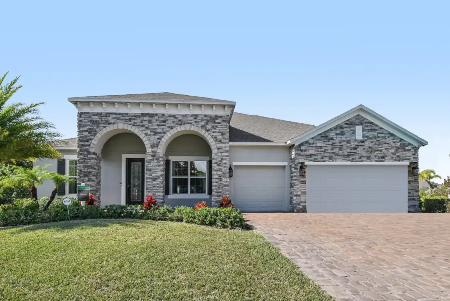 Representative exterior photo of a completed home built from the Sienna by Maronda Homes in Coastal Communities, Edgewater, FL (Image 24).