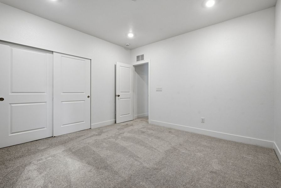 Spacious, unfurnished interior of a new home in Trailstone, Arvada (Image 29).