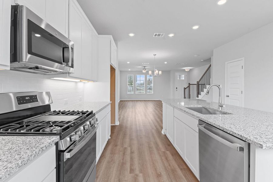 Furnished interior view inside a new home in Retreat at Hero Way, Leander (Image 10).