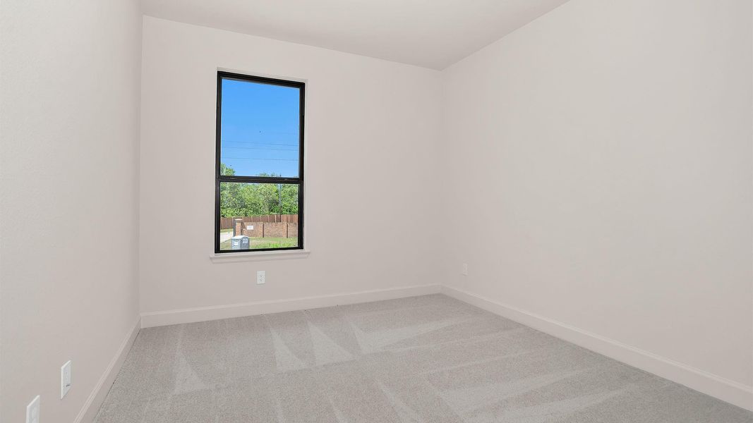 Spacious, unfurnished interior of a new home in Sienna, Missouri City (Image 10).