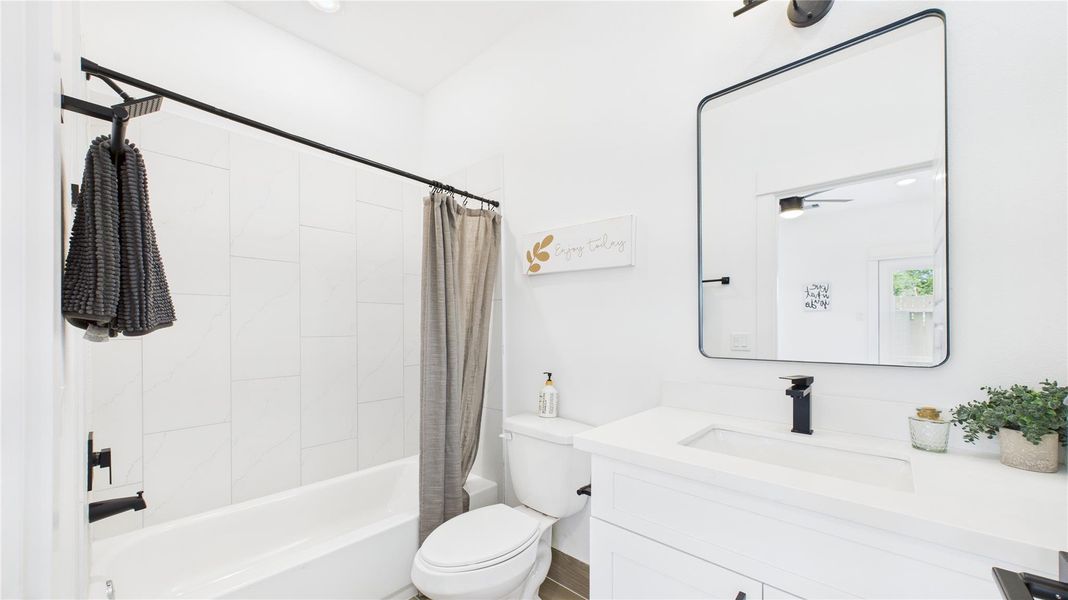 This elegant ensuite bathroom offers both privacy and convenience, seamlessly integrated within the bedroom for effortless accessibility. Featuring modern fixtures, a well-lit vanity, and a spacious shower/bathtub combo, it provides a luxurious retreat for relaxation. Thoughtfully designed with high-quality finishes, this bathroom enhances the bedroom’s functionality. This elegant ensuite bathroom offers both privacy and convenience, seamlessly integrated within the bedroom for effortless accessibility. Featuring modern fixtures, a well-lit vanity, and a spacious shower/bathtub combo, it provides a luxurious retreat for relaxation. Thoughtfully designed with high-quality finishes, this bathroom enhances the bedroom’s functionality.