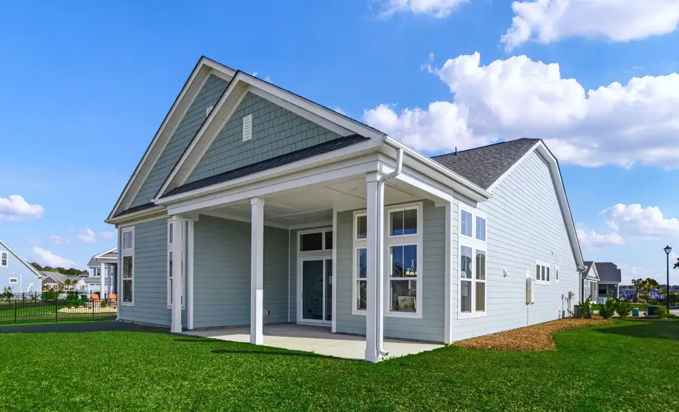 Exterior details and patio area of a home in Bridgewater - Waterside Village, Little River (Image 3).