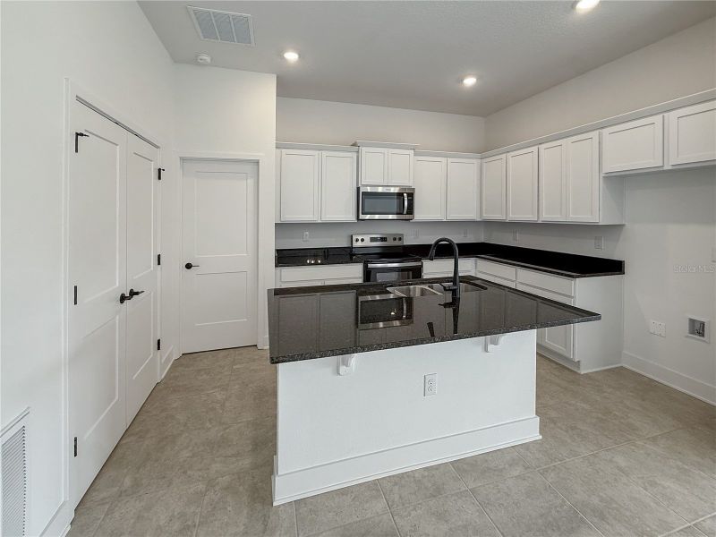 Furnished interior view inside a new home in Arbor Park, Leesburg (Image 4).