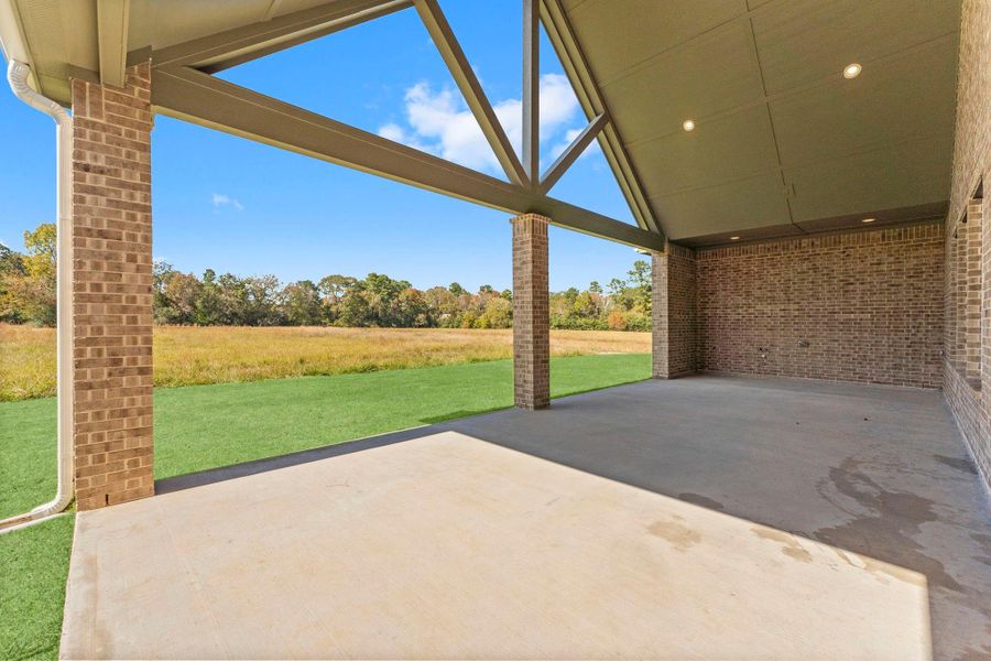 Exterior details and patio area of a home in Homestead Hill, New Waverly (Image 19).