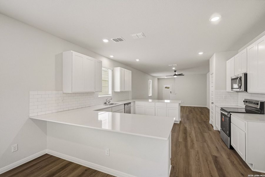 Furnished interior view inside a new home in Cinco Lakes, San Antonio (Image 7).