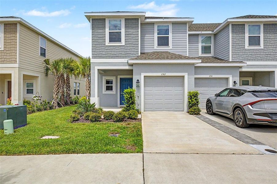 Front exterior of a new home in , Wesley Chapel, FL, highlighting curb appeal (Image 2). Front exterior of a new home in , Wesley Chapel, FL, highlighting curb appeal (Image 2).