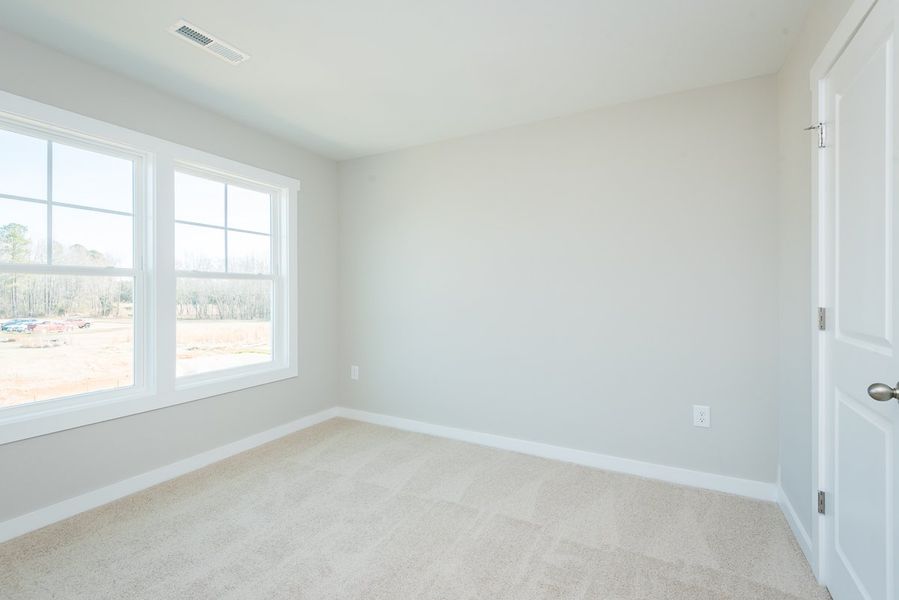 Spacious, unfurnished interior of a new home in Pallini Place, Elon (Image 20).