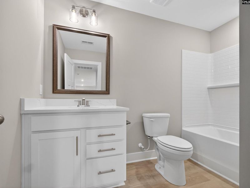 Furnished interior view inside a new home in Collins Cove, Chapin (Image 17).