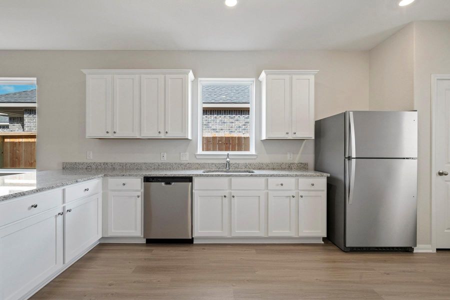 Furnished interior view inside a new home in Canterra Creek, Iowa Colony (Image 4).